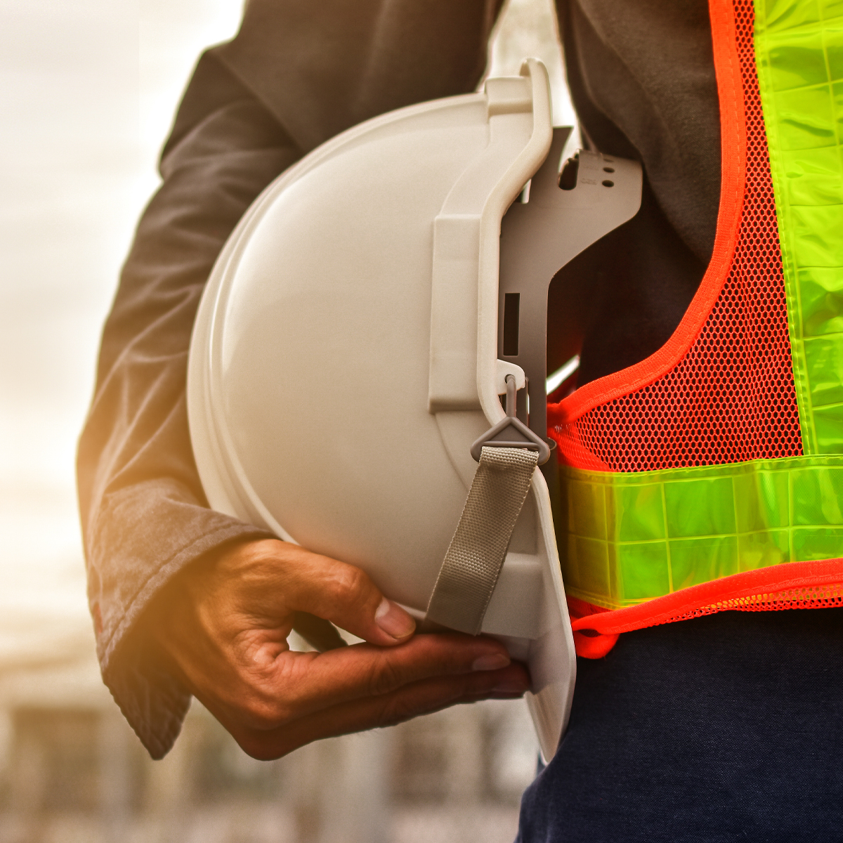 Electrical contractors discuss plans in a new construction home.