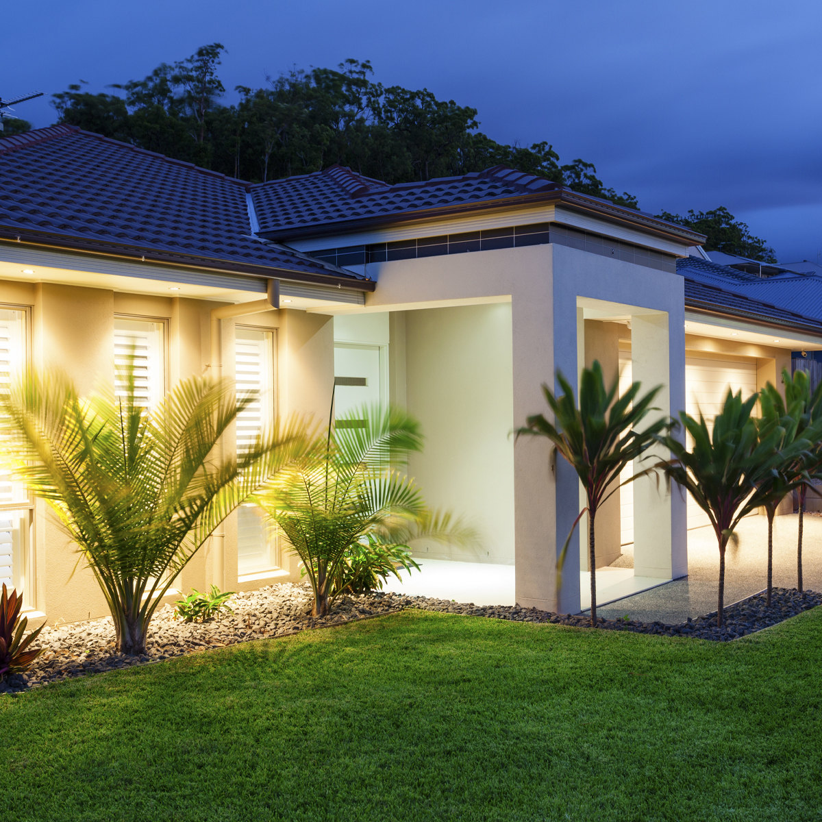 Electrical contractors discuss plans in a new construction home.